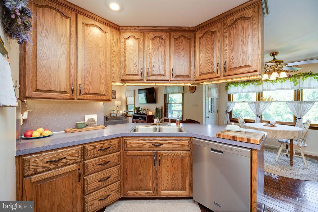 881 Zion Road Mohnton, PA 19540 - Photo 24 of 64 Warm oak cabinetry in a cozy kitchen.