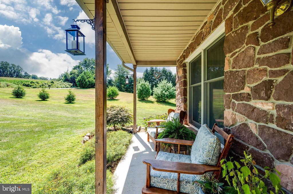 881 Zion Road Mohnton, PA 19540 - Photo 47 of 64 Charming porch with scenic countryside views.