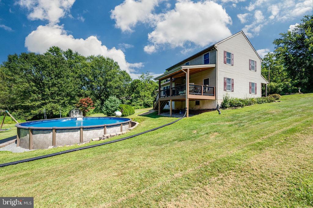 881 Zion Road Mohnton, PA 19540 - Photo 51 of 64 Charming home with pool and lush greenery.