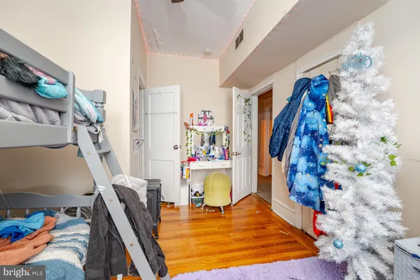 a bed room with furniture and decor