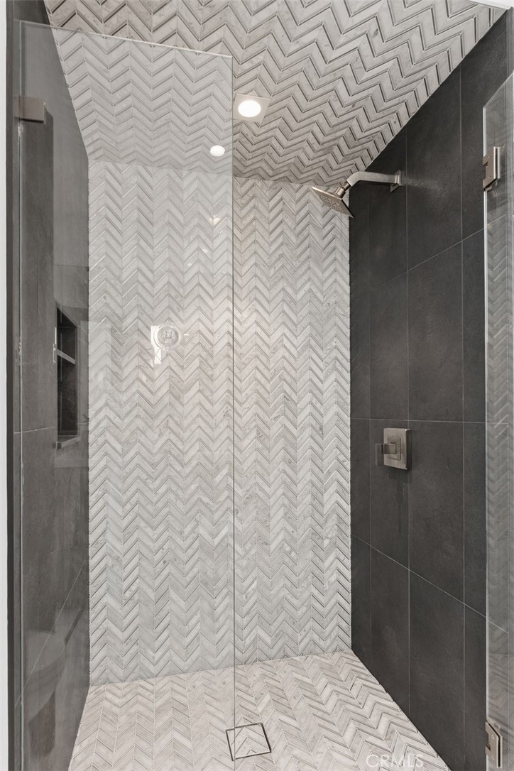 67 Monarch Bay Drive Dana Point, CA 92629 - Photo 33 of 44 a bathroom with a shower