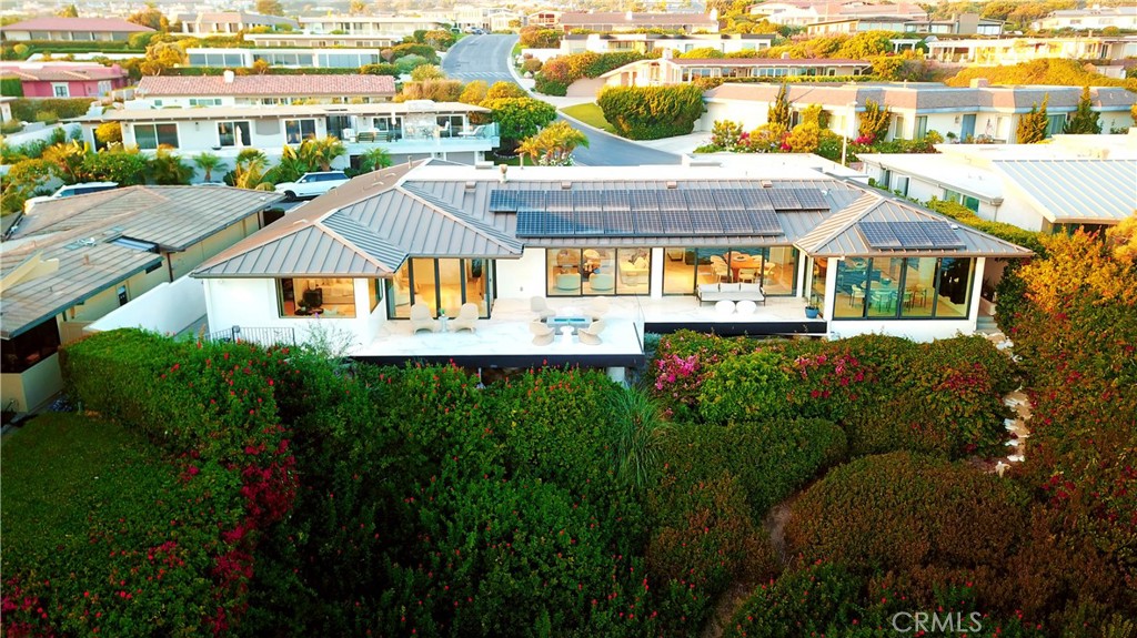 67 Monarch Bay Drive Dana Point, CA 92629 - Photo 43 of 44 a aerial view of a house with a garden and plants