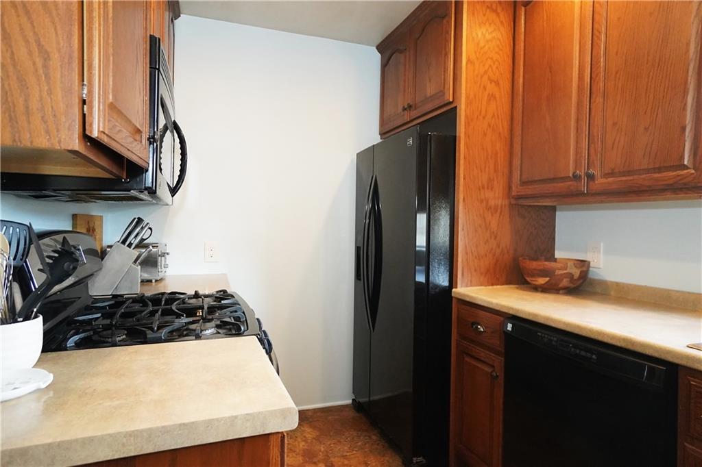 124 Hazel Street Kittanning, PA 16201 - Photo 12 of 26 a kitchen with a sink and a stove