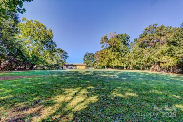 a yard with lots of green space