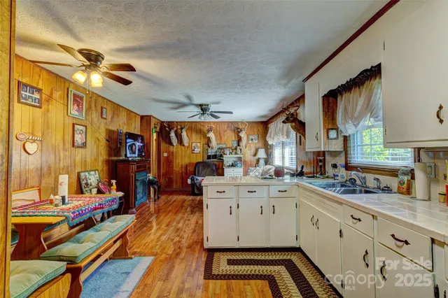 a very nice looking room with kitchen area