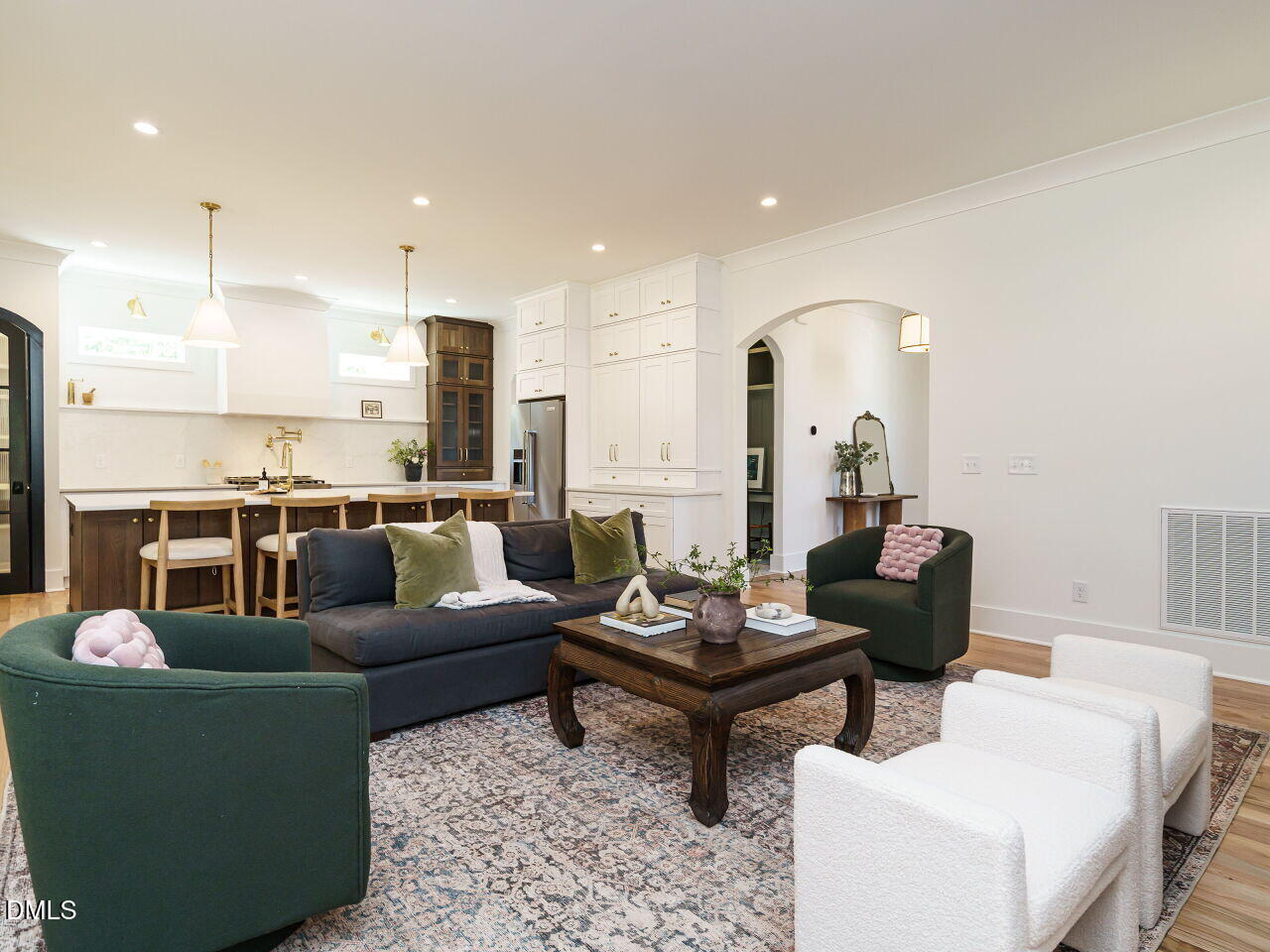 627 Georgetown Road Raleigh, NC 27608 - Photo 14 of 44 a living room with furniture and a view of kitchen