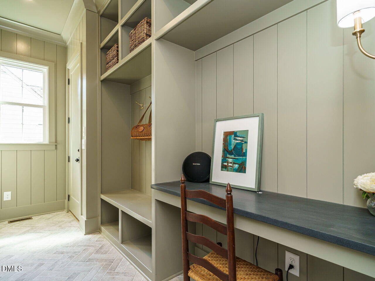 627 Georgetown Road Raleigh, NC 27608 - Photo 20 of 44 a view of a hallway with front door and wooden floor