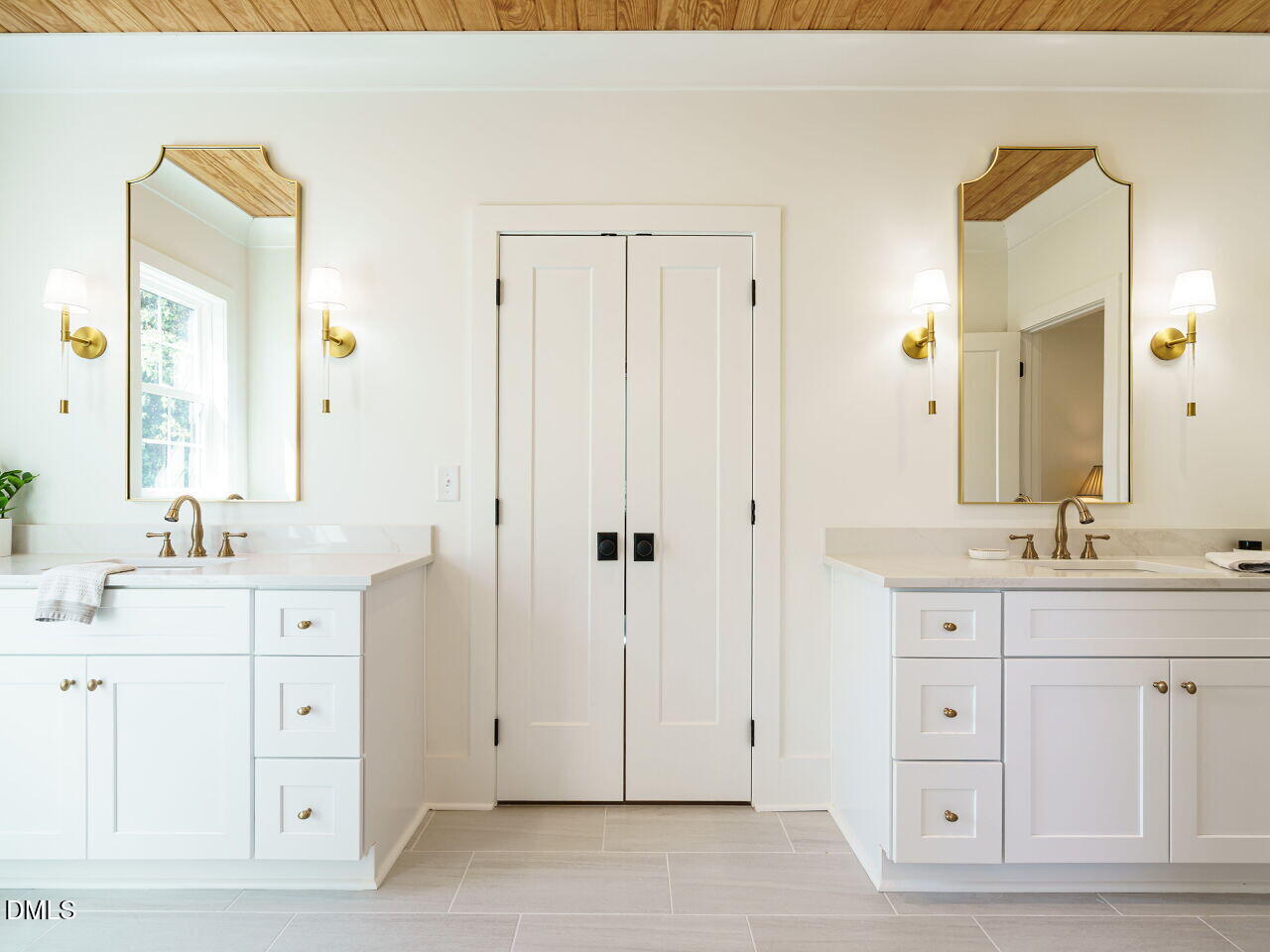 627 Georgetown Road Raleigh, NC 27608 - Photo 27 of 44 a spacious bathroom with a double vanity sink mirror and