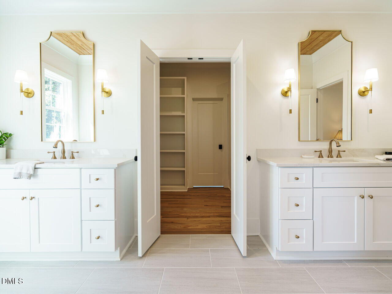 627 Georgetown Road Raleigh, NC 27608 - Photo 28 of 44 a bathroom with a sink vanity and a mirror