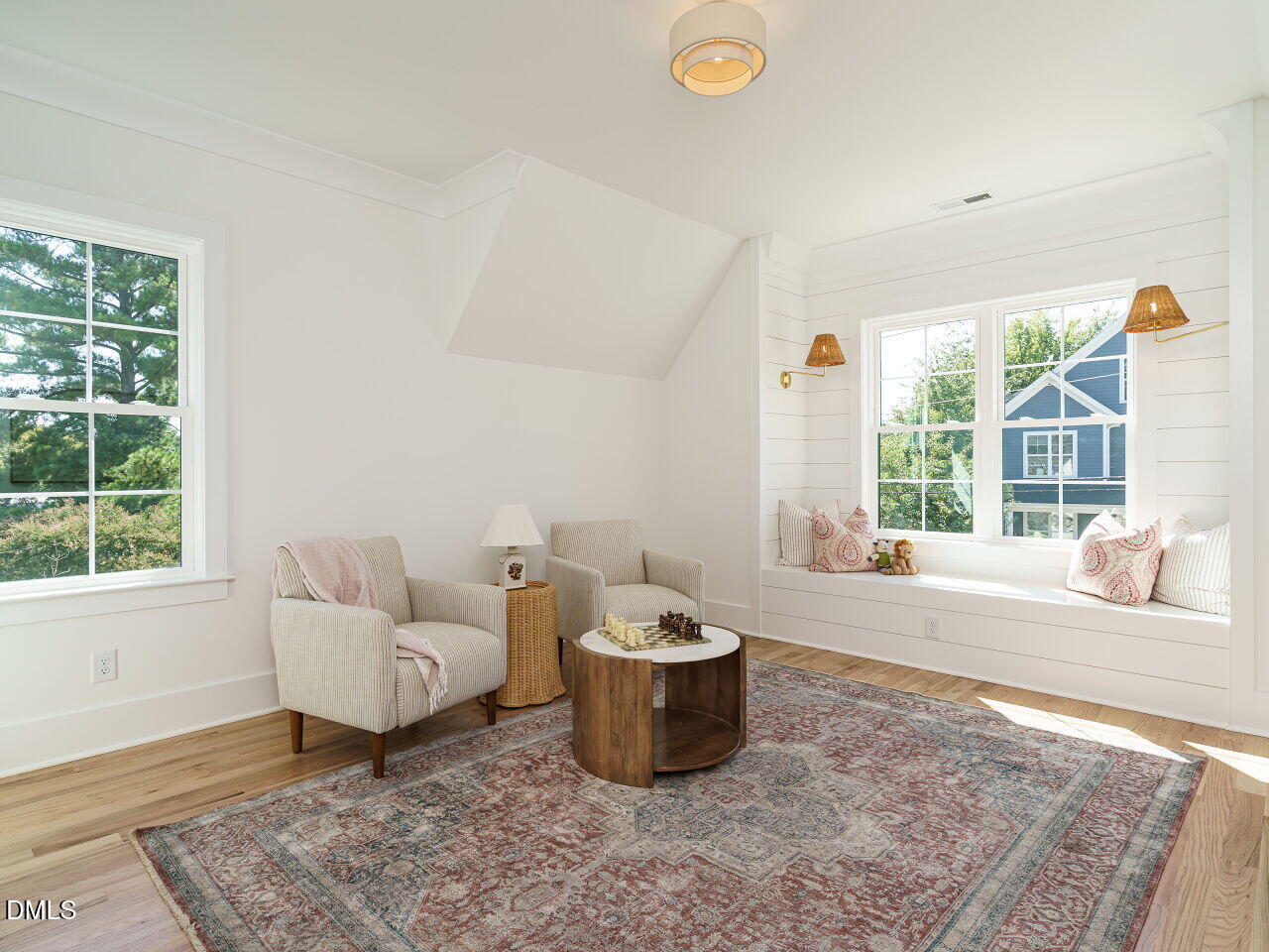627 Georgetown Road Raleigh, NC 27608 - Photo 35 of 44 a living room with furniture and a window