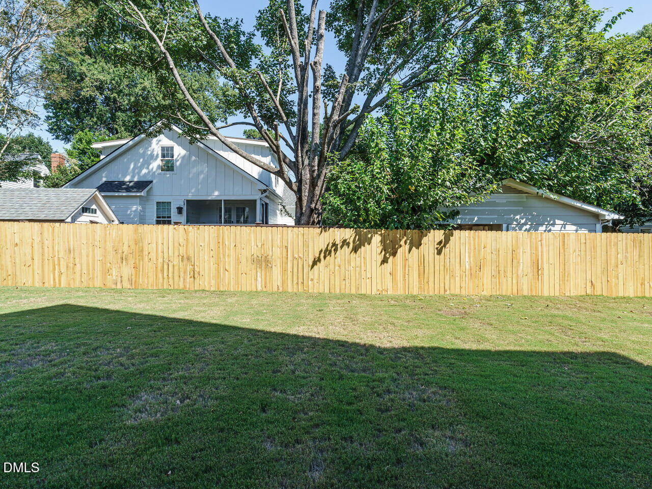 627 Georgetown Road Raleigh, NC 27608 - Photo 41 of 44 a front view of a house with a garden