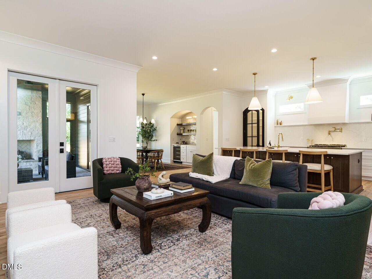 627 Georgetown Road Raleigh, NC 27608 - Photo 10 of 44 a living room with furniture and a view of kitchen