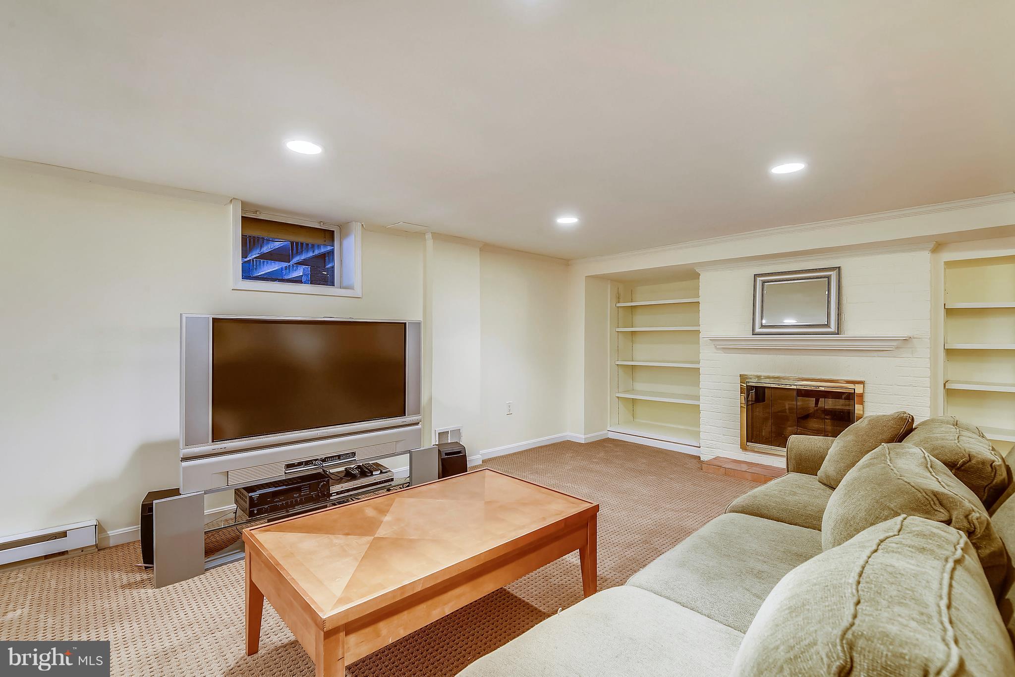 1701 Sherwood Road Silver Spring, MD 20902 - Photo 45 of 63 Second Fireplace in Lower Level Family Room