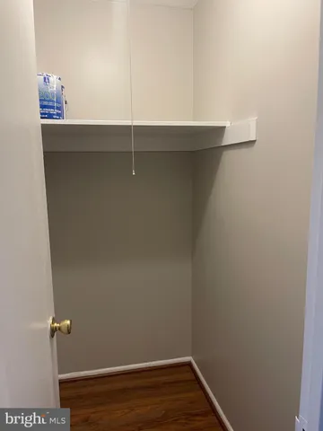 a view of small space with racks on the wall