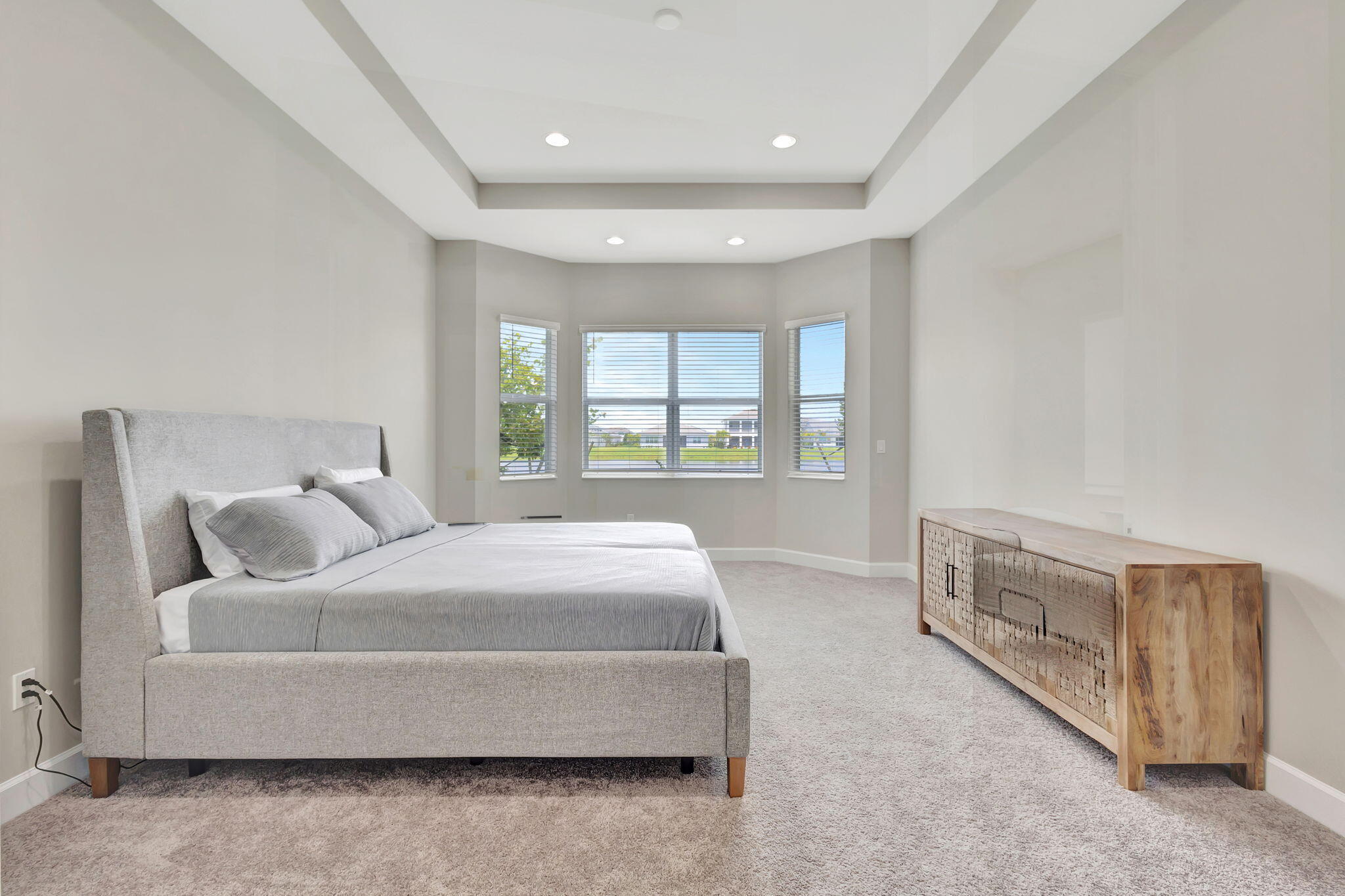 5403 Macoon Way Westlake, FL 33470 - Photo 13 of 51 a spacious bedroom with a bed and a window