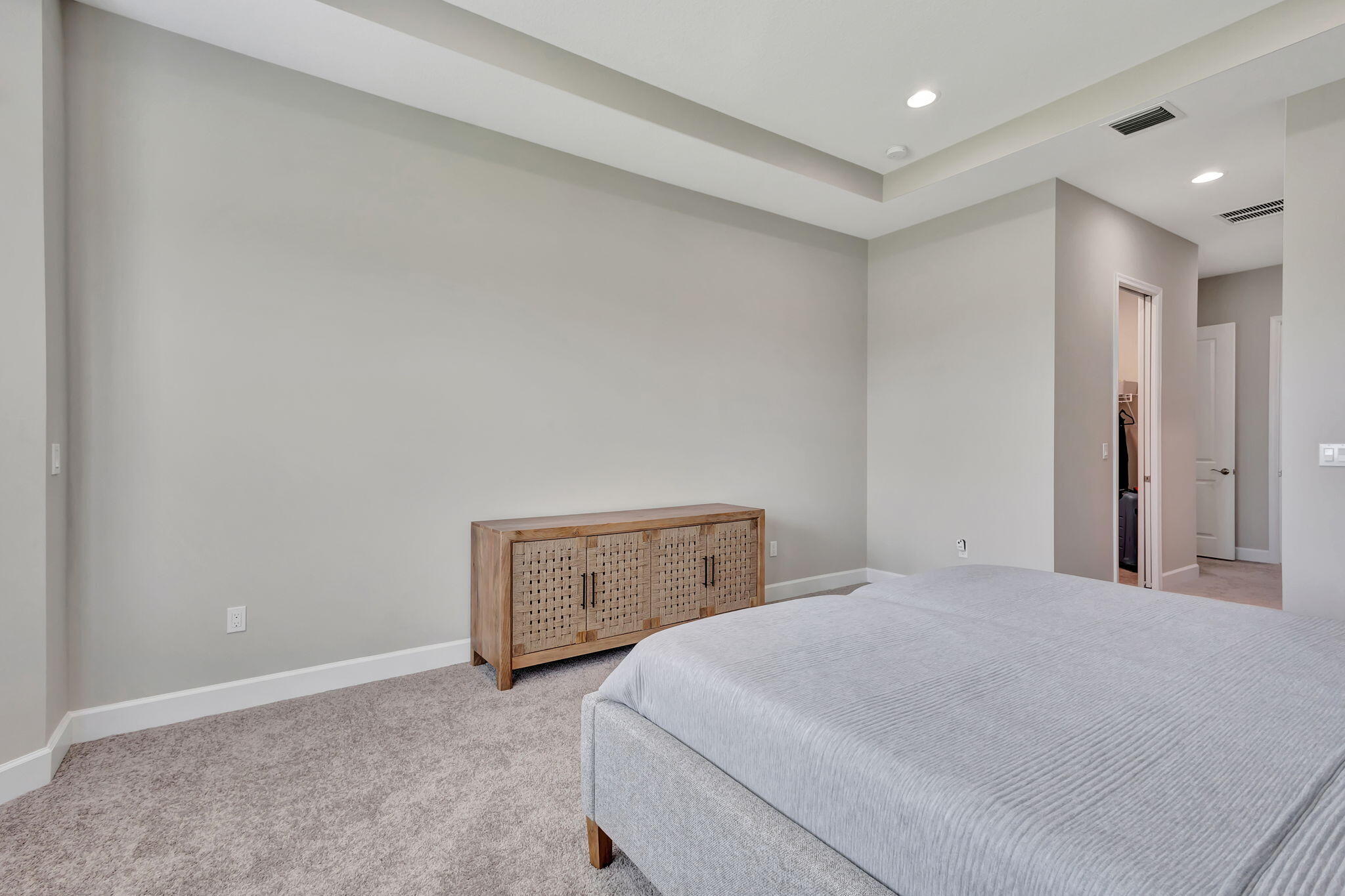 5403 Macoon Way Westlake, FL 33470 - Photo 15 of 51 a bedroom with a bed and a table