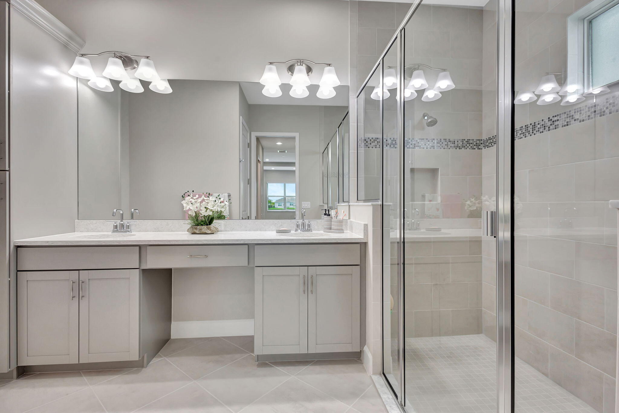 5403 Macoon Way Westlake, FL 33470 - Photo 16 of 51 a bathroom with a sink vanity and a mirror