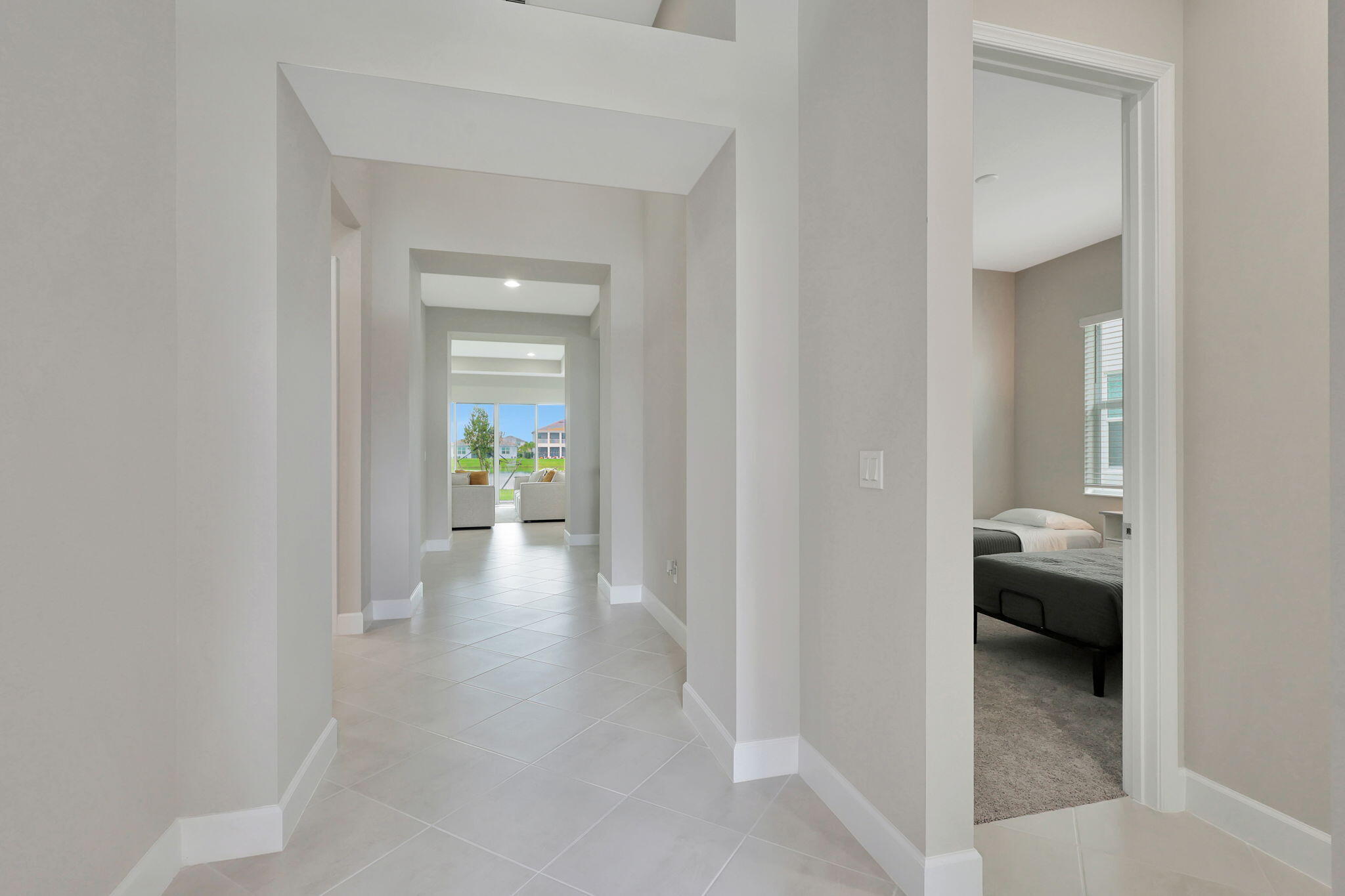 5403 Macoon Way Westlake, FL 33470 - Photo 28 of 51 a view of a hallway and a livingroom with a furniture
