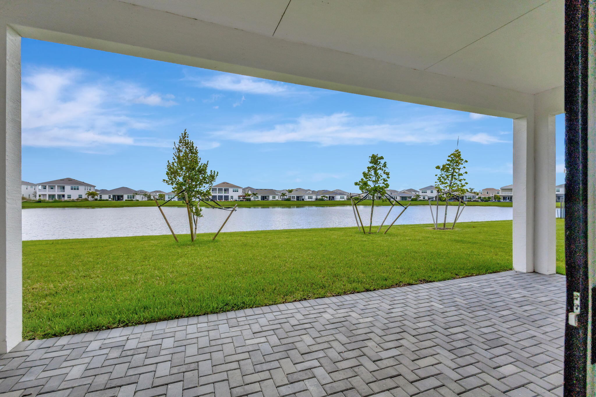5403 Macoon Way Westlake, FL 33470 - Photo 32 of 51 a view of a golf course with a garden