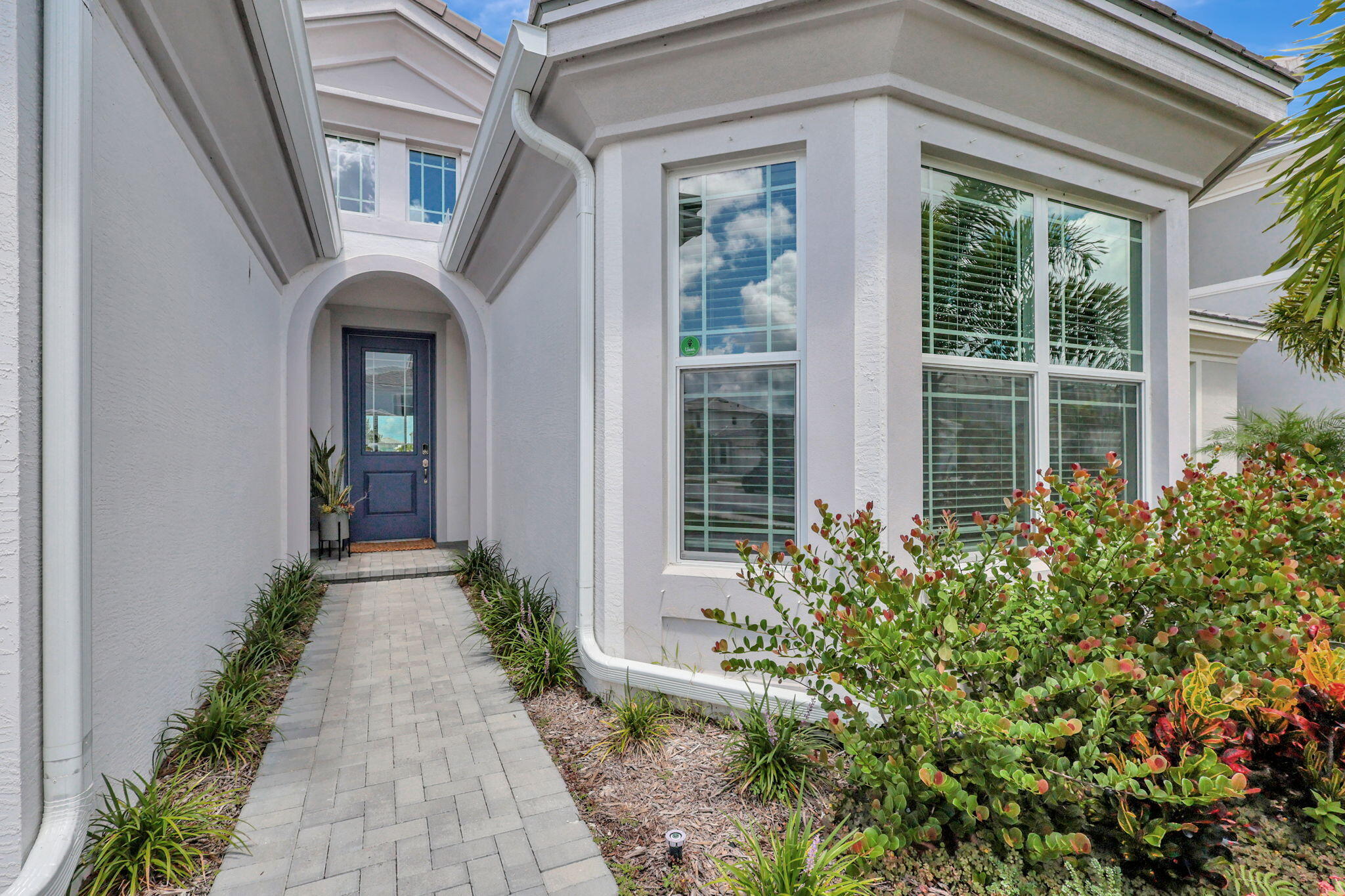 5403 Macoon Way Westlake, FL 33470 - Photo 5 of 51 a front view of a house with a porch