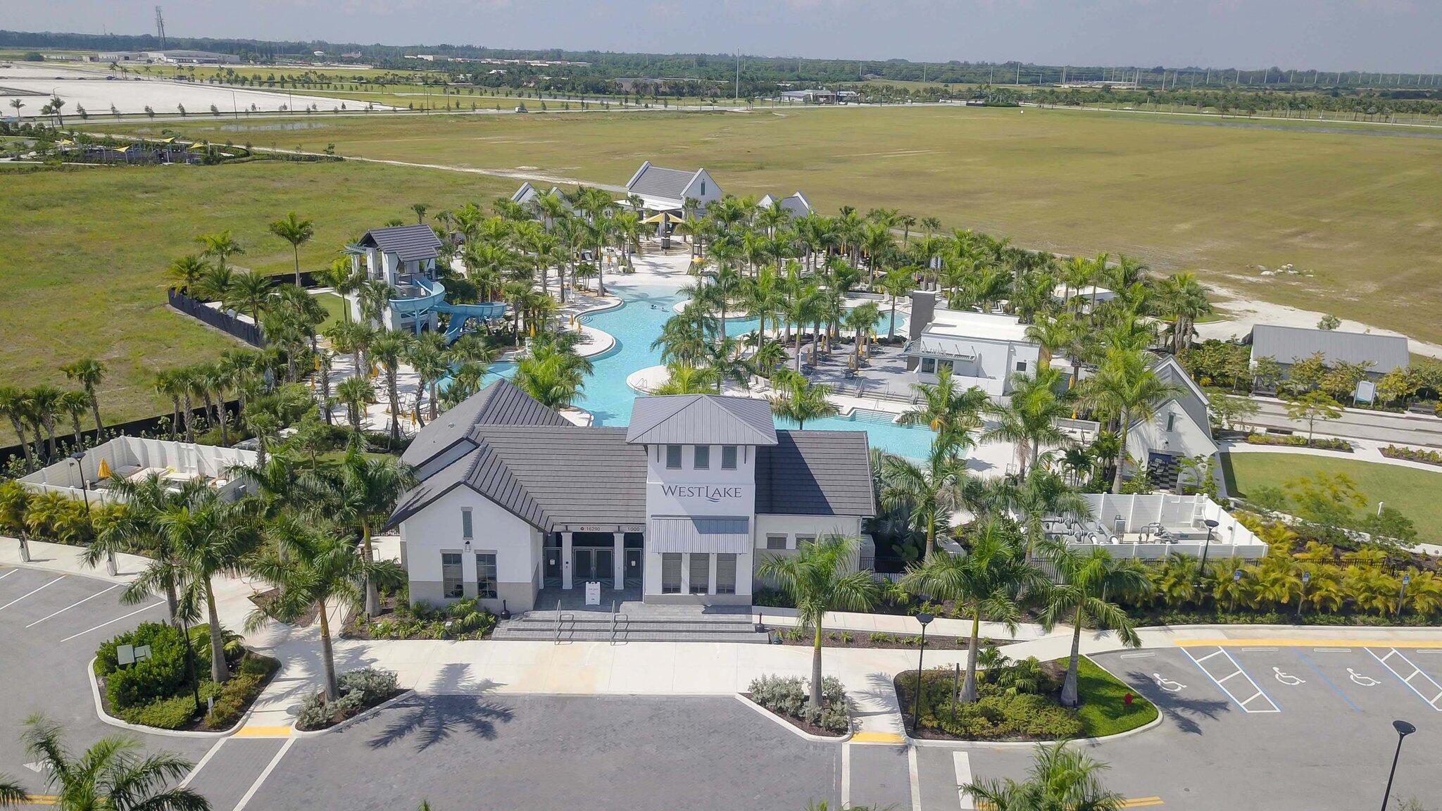 5403 Macoon Way Westlake, FL 33470 - Photo 51 of 51 a view of a lake with a garden and lake view