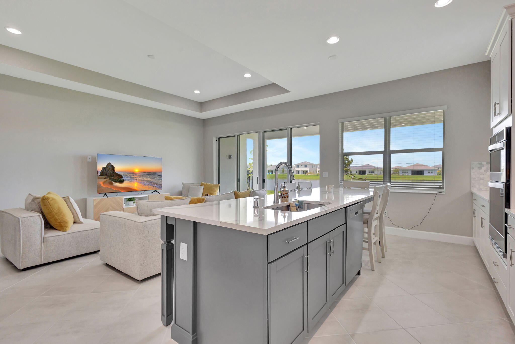5403 Macoon Way Westlake, FL 33470 - Photo 10 of 51 a living room with furniture and a flat screen tv