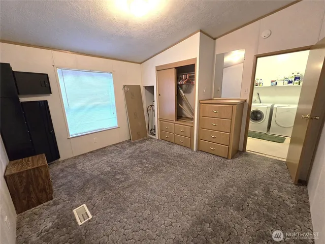 a view of livingroom with furniture and windows