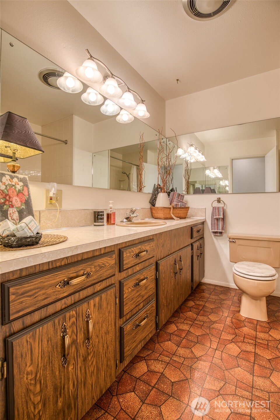 6109 Ridgeview Drive Aberdeen, WA 98520 - Photo 26 of 38 a spacious bathroom with a double vanity sink mirror and toilet