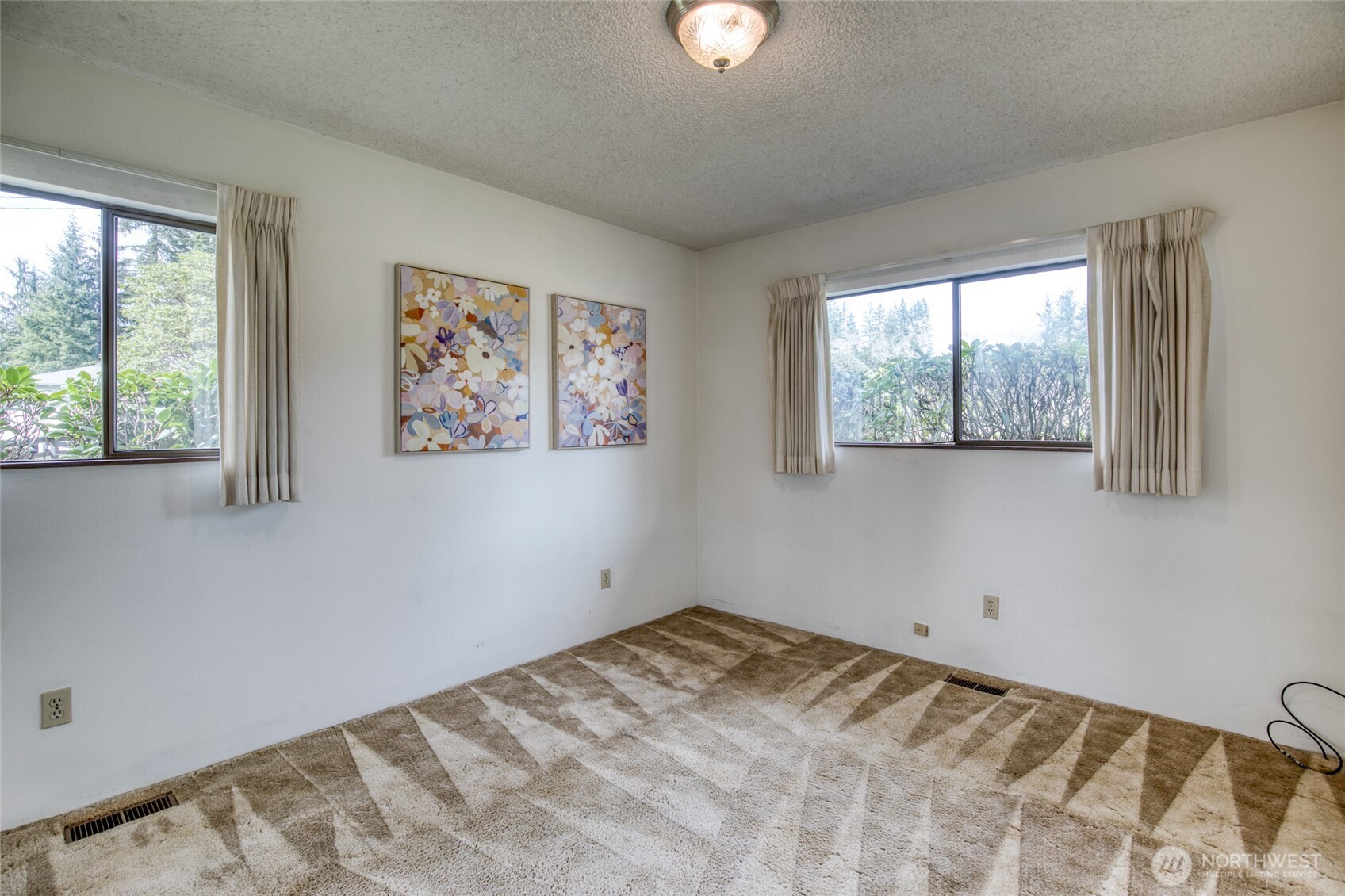 6109 Ridgeview Drive Aberdeen, WA 98520 - Photo 31 of 38 a view of a bedroom with a bed and a window