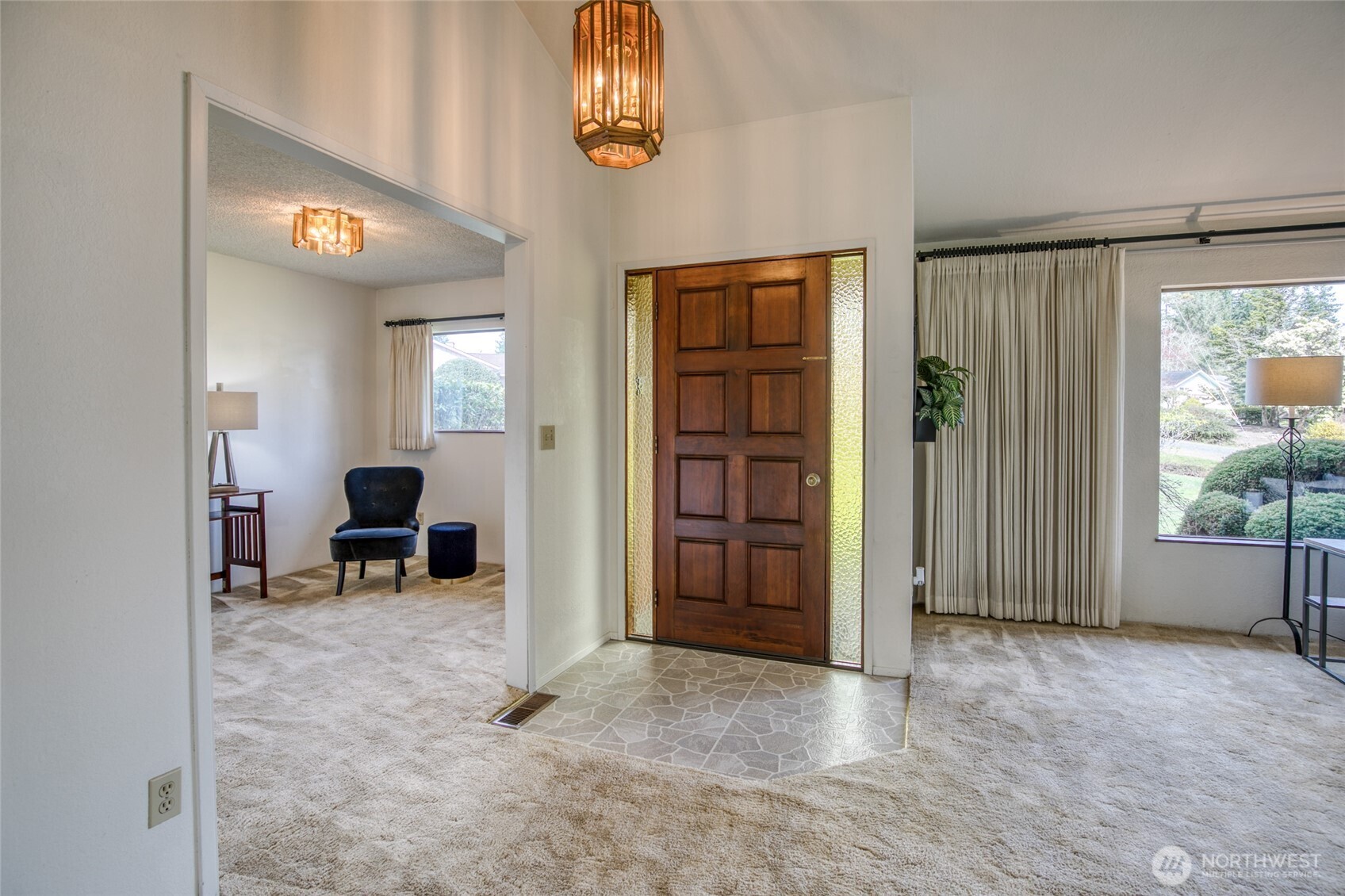 6109 Ridgeview Drive Aberdeen, WA 98520 - Photo 8 of 38 a view of a hallway with furniture and a window