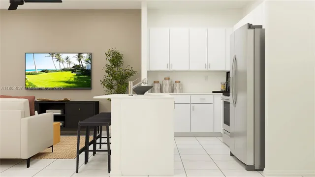 a kitchen with a refrigerator and a stove top oven