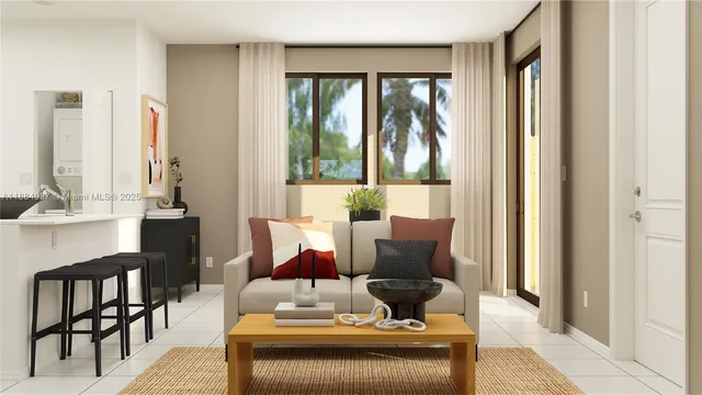 a living room with furniture and a large window