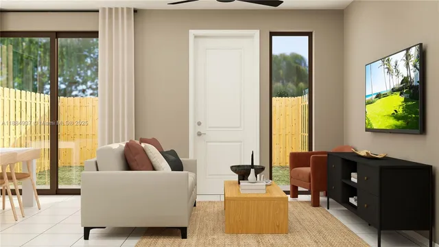 a living room with furniture and a flat screen tv