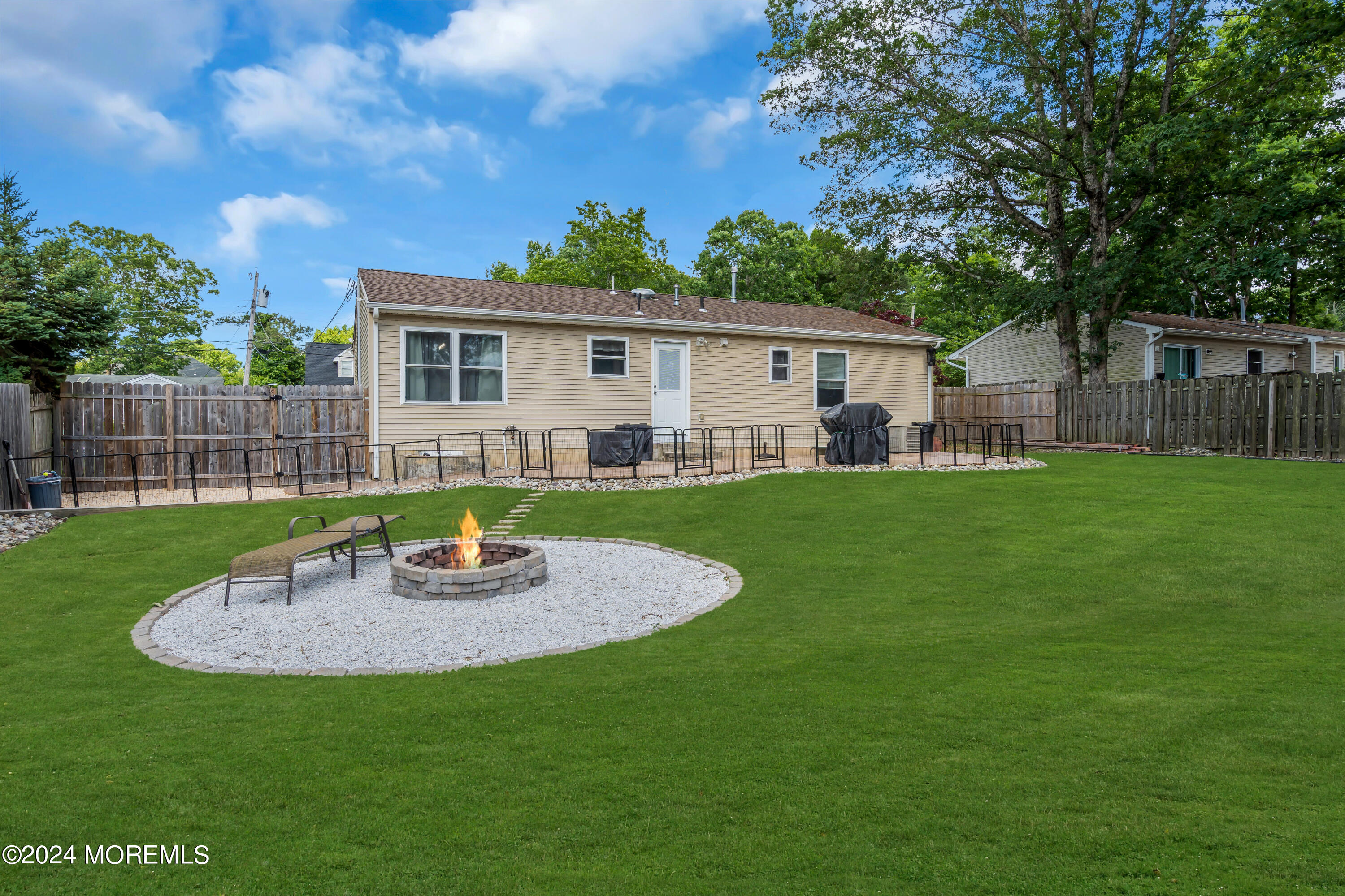 172 Stowaway Road Manahawkin, NJ 08050 - Photo 24 of 36 a house view with a garden space