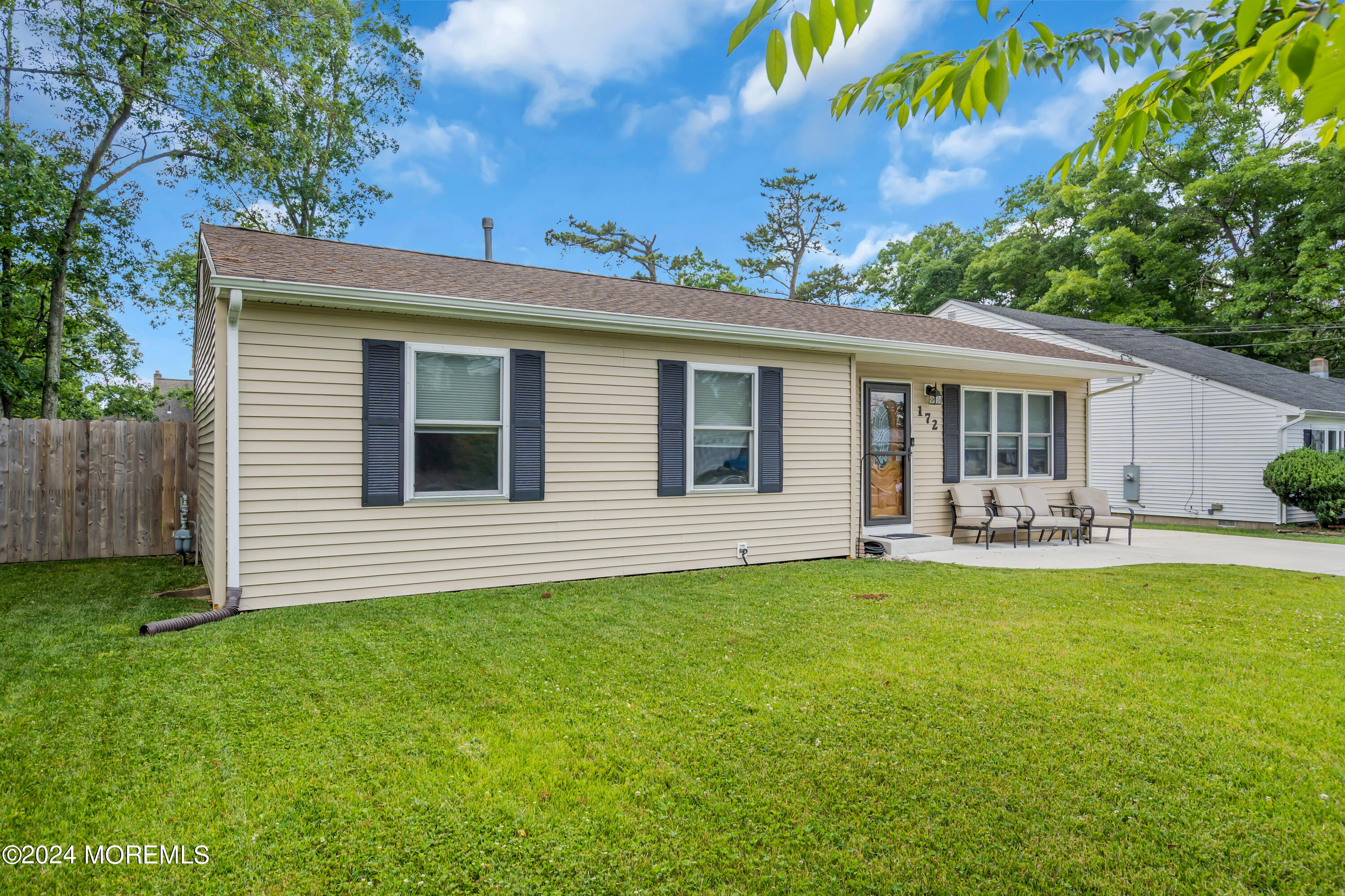 172 Stowaway Road Manahawkin, NJ 08050 - Photo 3 of 36 a view of a house with a backyard