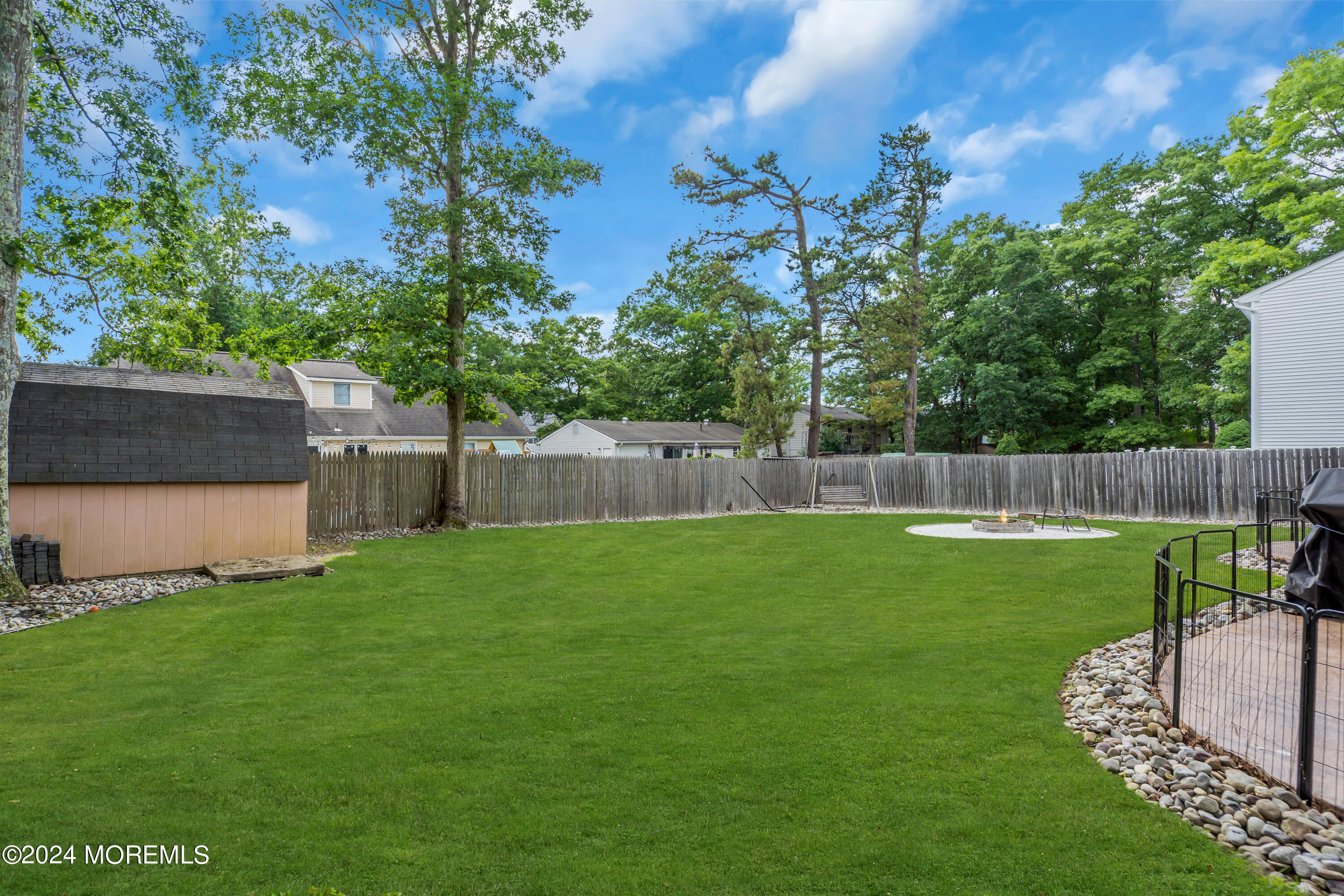 172 Stowaway Road Manahawkin, NJ 08050 - Photo 35 of 36 a view of a backyard