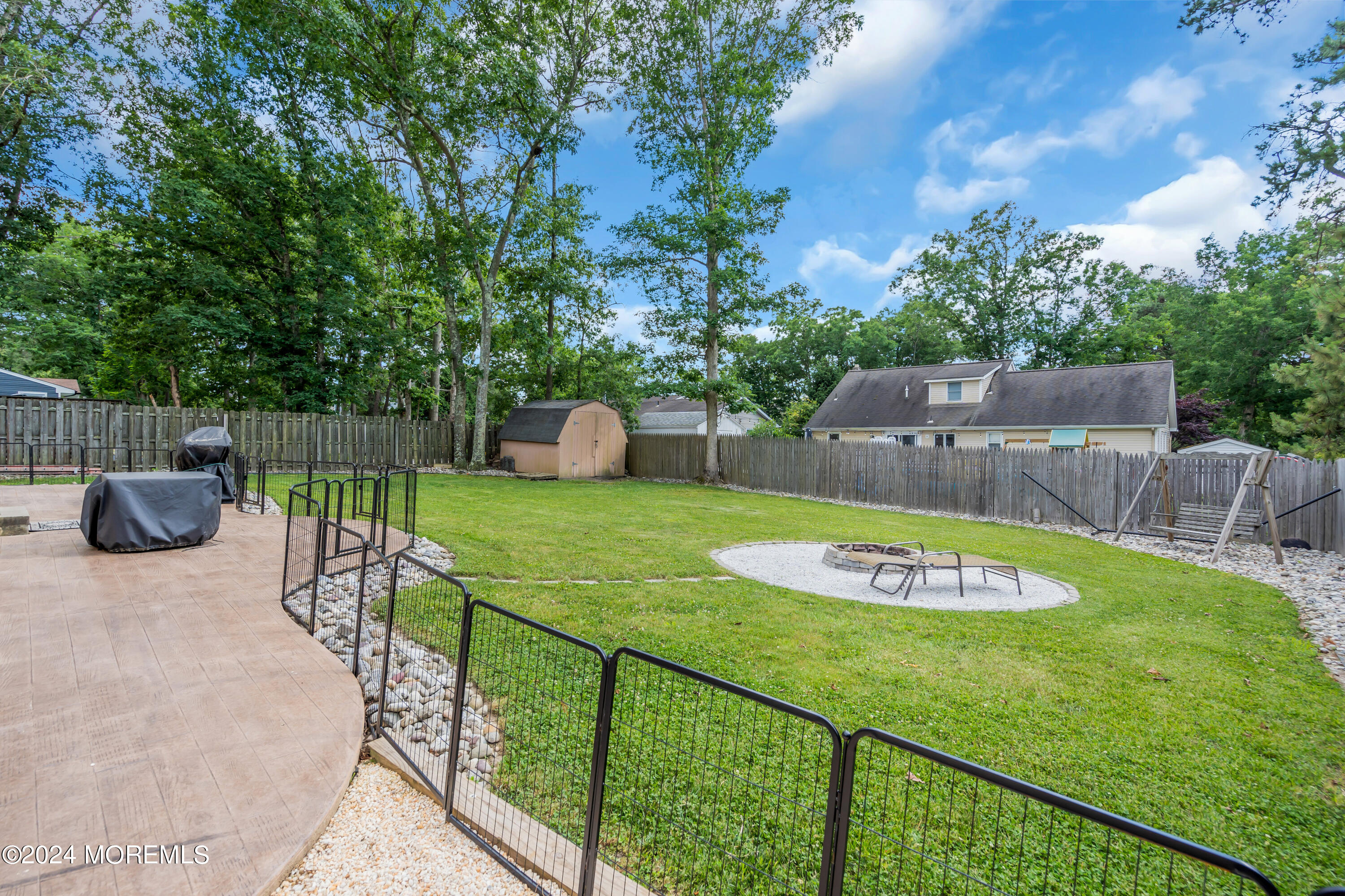 172 Stowaway Road Manahawkin, NJ 08050 - Photo 36 of 36 a view of a swimming pool with a seating and plants