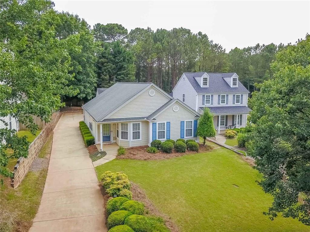 3059 Heatherbrook Trace Canton, GA 30114 - Photo 1 of 1 a front view of house with yard and green space