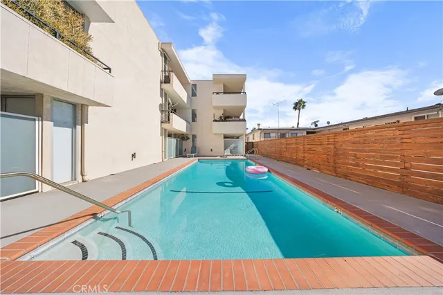 a view of a balcony with a tennis court