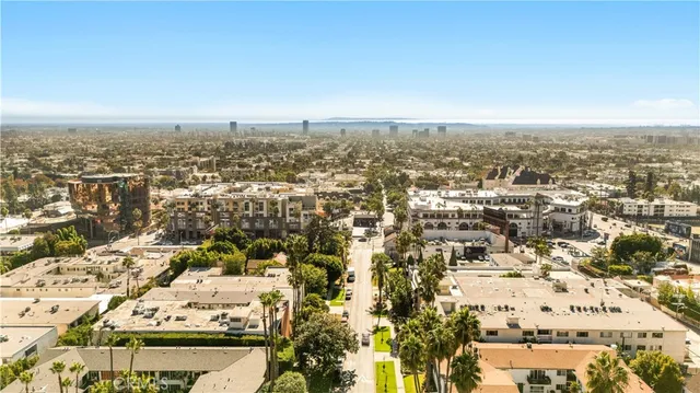 an aerial view of residential building with parking space