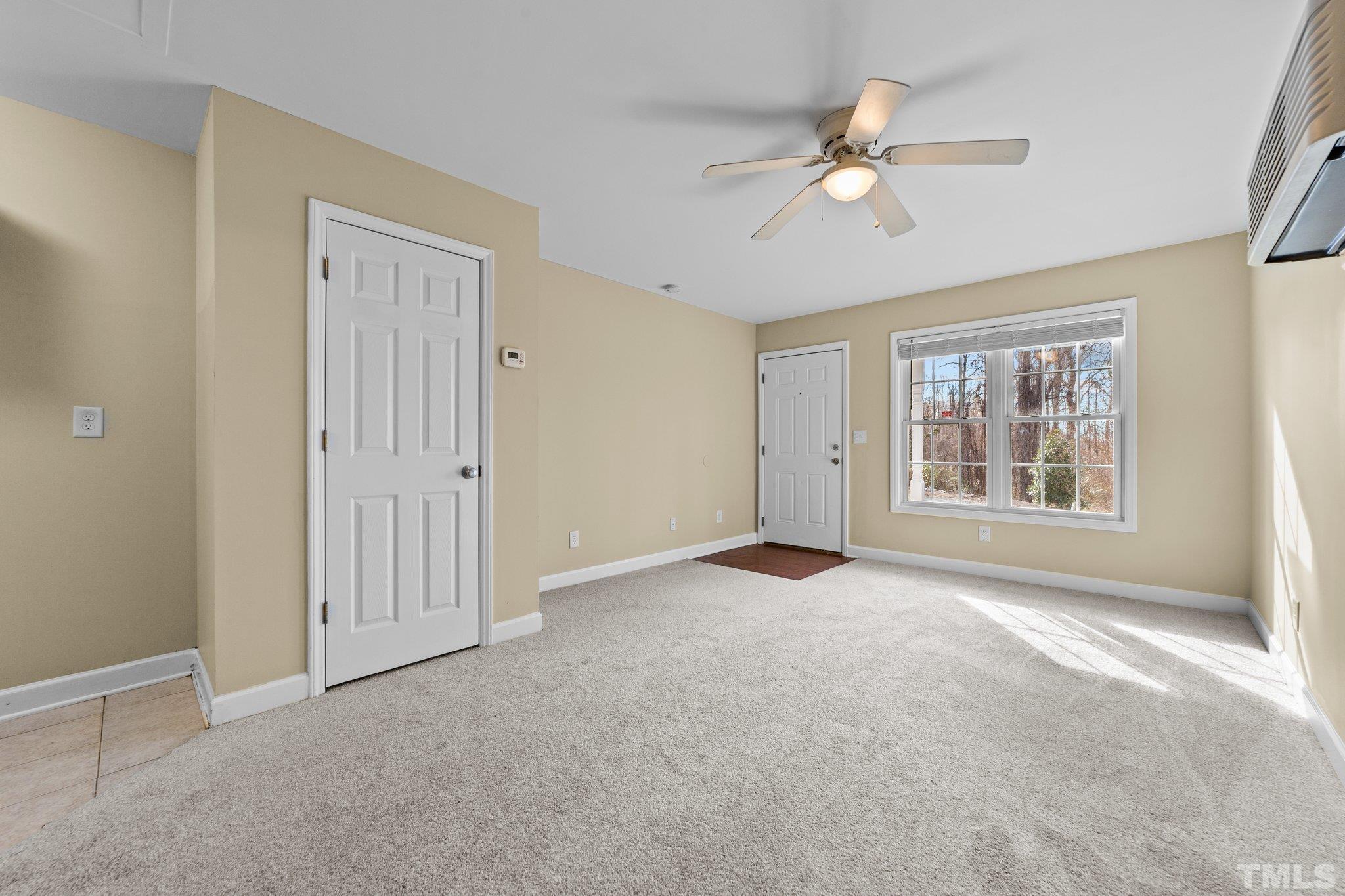 198 Garrett Street Roxboro, NC 27573 - Photo 14 of 17 a view of an empty room with a window