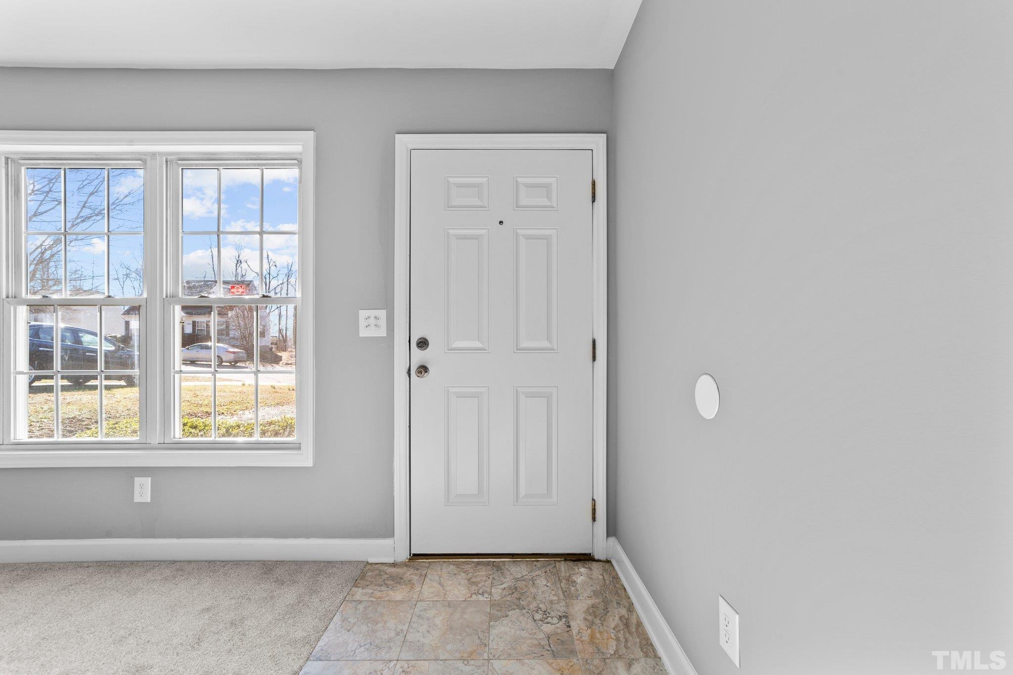 198 Garrett Street Roxboro, NC 27573 - Photo 4 of 17 a view of an empty room with a window
