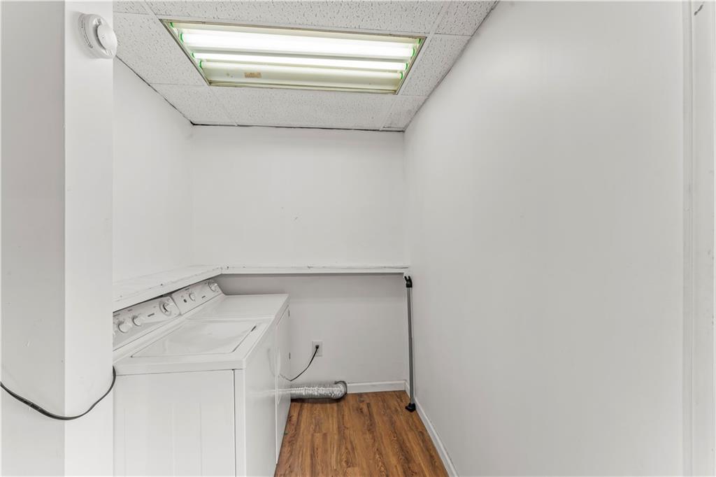 1877 Chapman Street Pittsburgh, PA 15215 - Photo 14 of 28 a utility room with dryer and washer