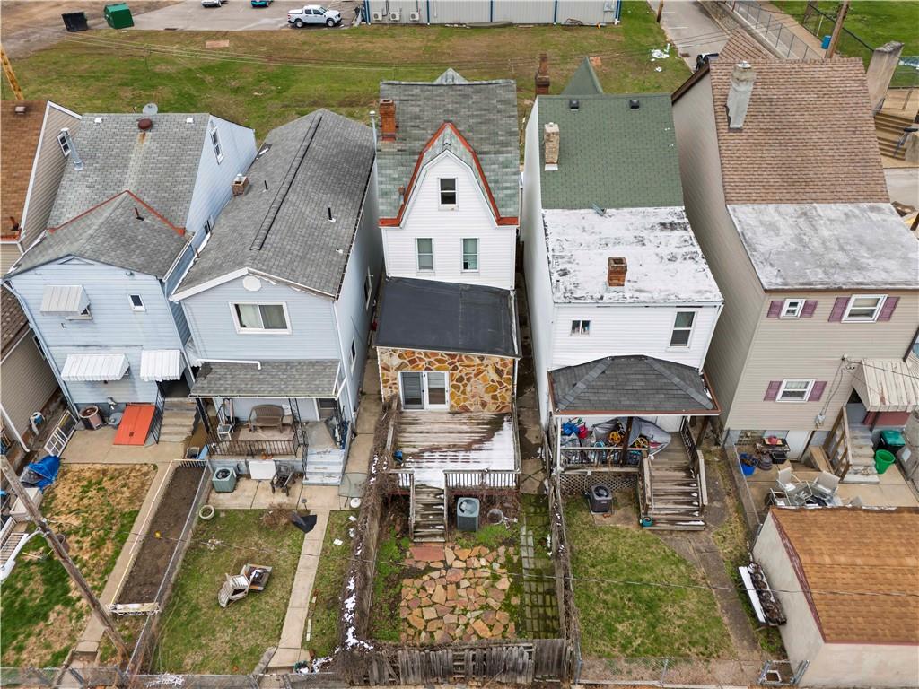 1877 Chapman Street Pittsburgh, PA 15215 - Photo 4 of 28 an aerial view of a house with a garden potted plants and large trees