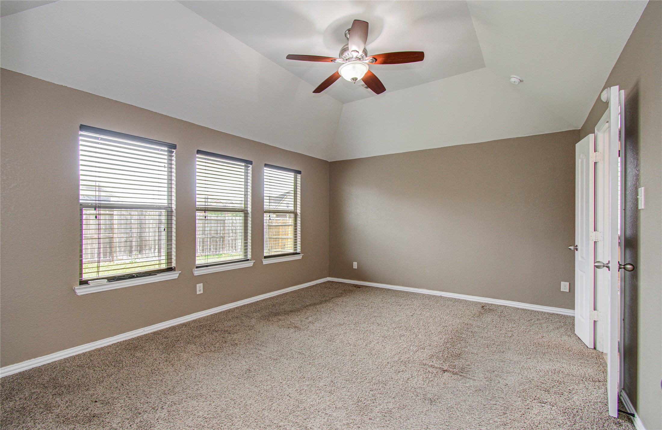 17702 Jacobs Ladder Court Tomball, TX 77377 - Photo 20 of 36 a view of an empty room with a window