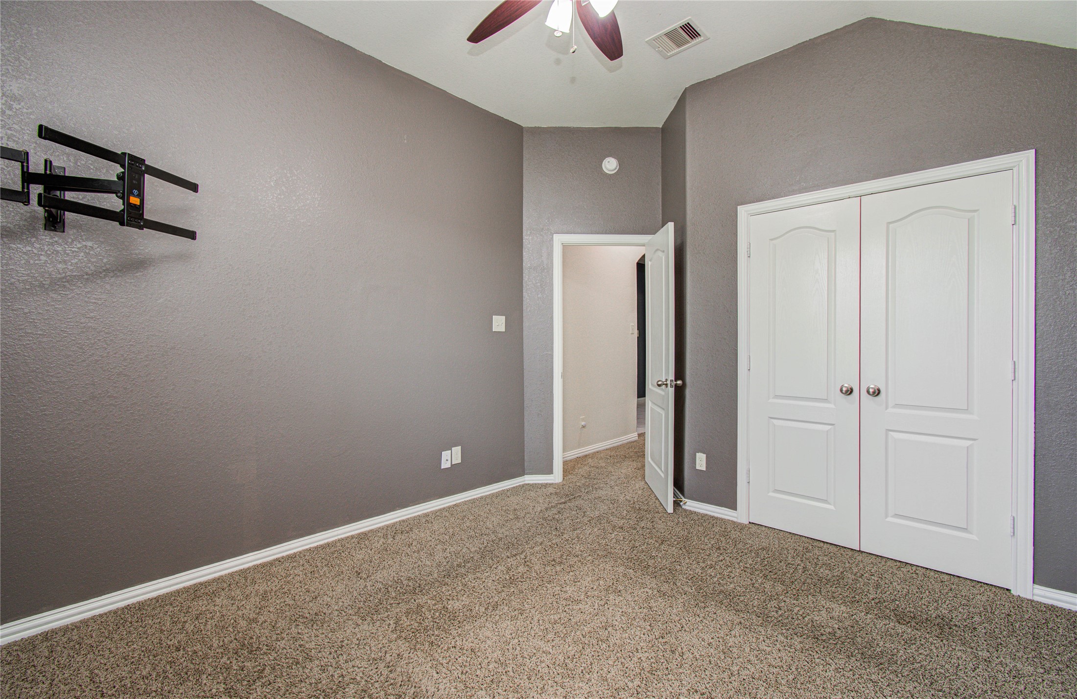 17702 Jacobs Ladder Court Tomball, TX 77377 - Photo 21 of 36 an empty room with closet and windows