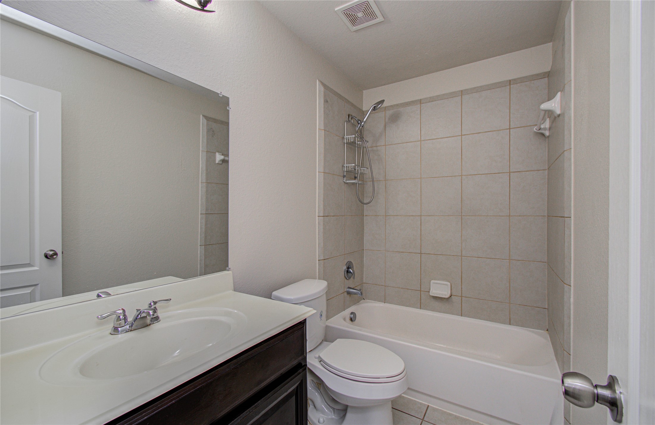 17702 Jacobs Ladder Court Tomball, TX 77377 - Photo 30 of 36 a bathroom with a sink toilet and shower