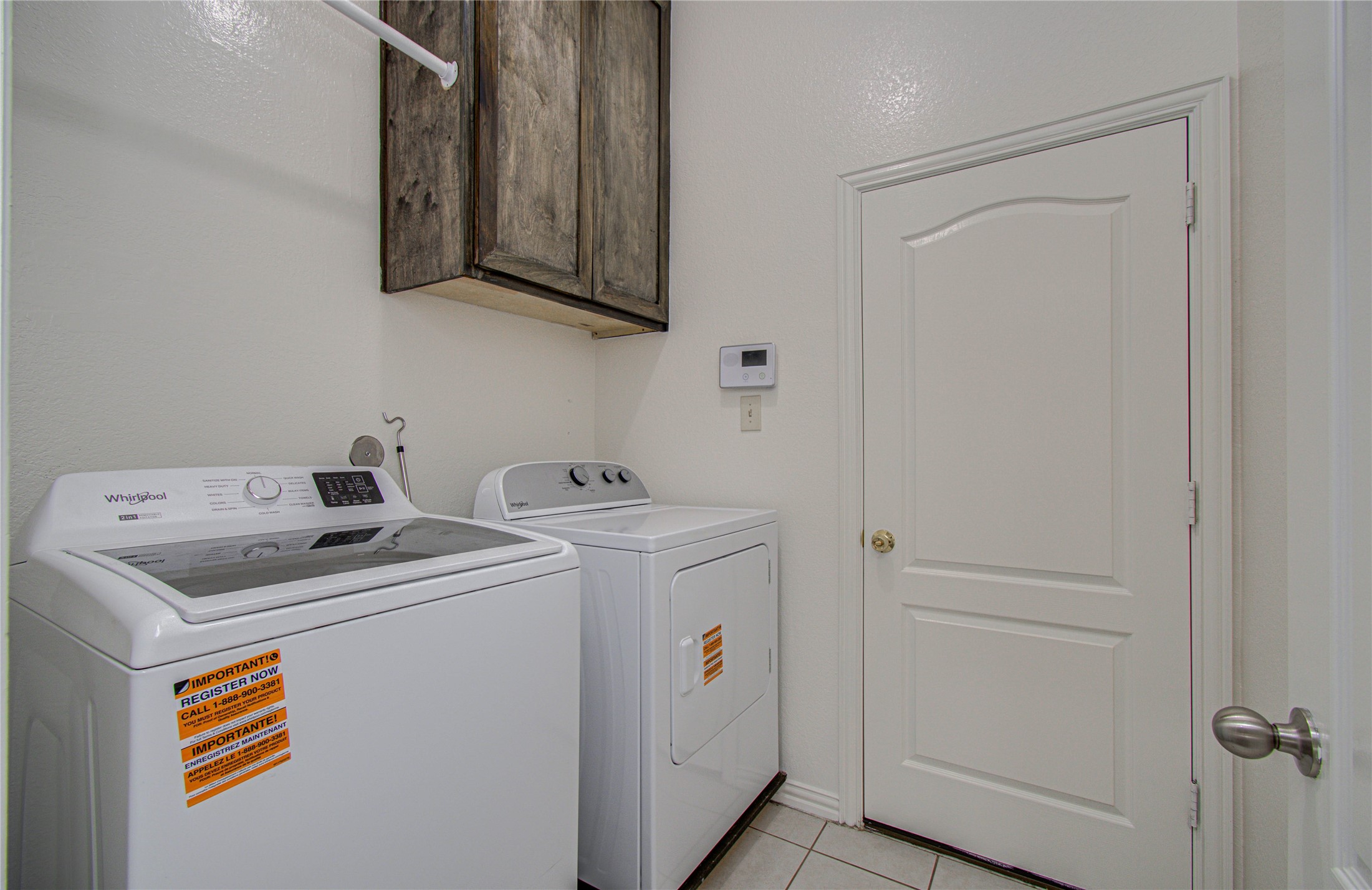 17702 Jacobs Ladder Court Tomball, TX 77377 - Photo 32 of 36 a utility room with dryer and washer
