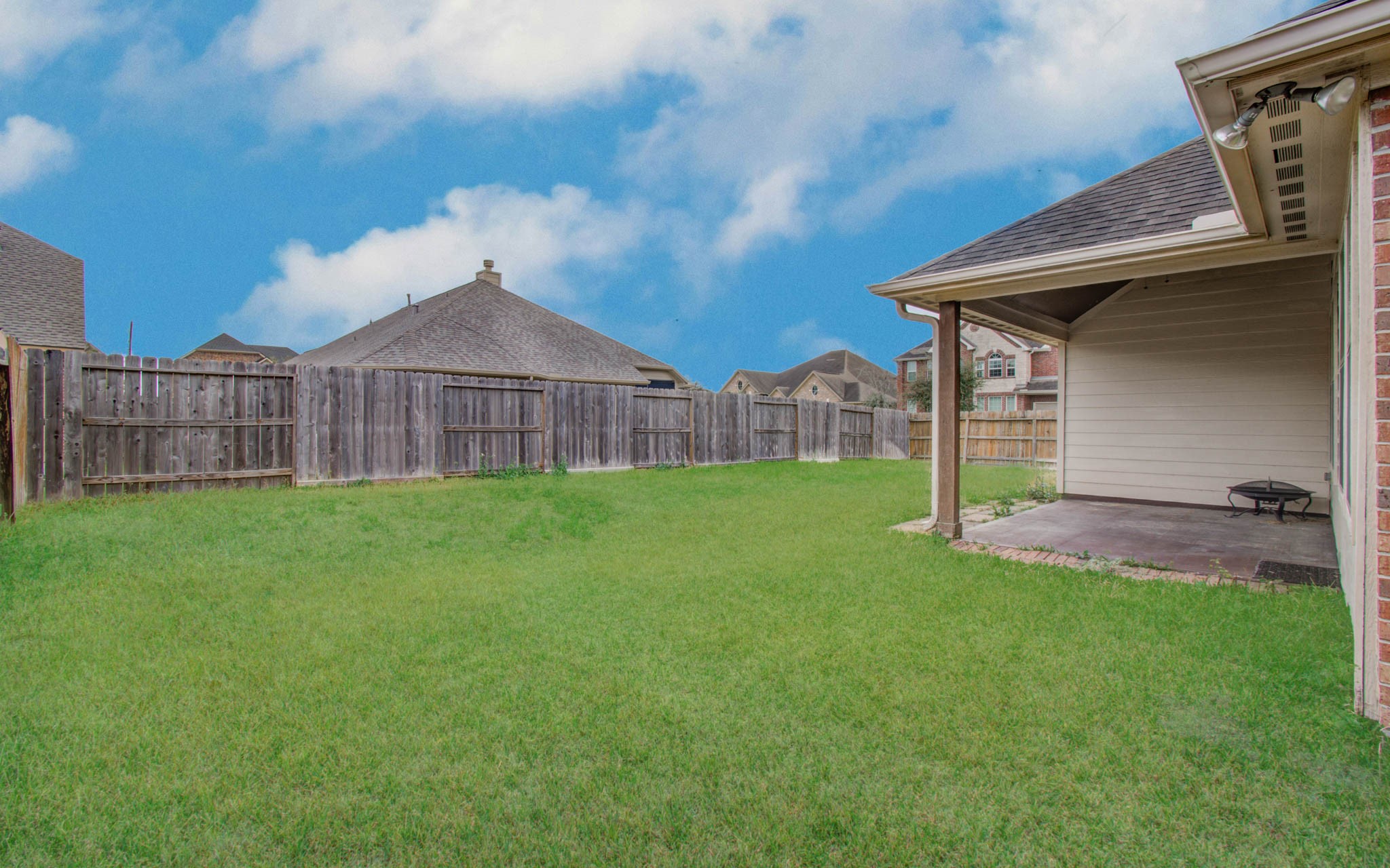 17702 Jacobs Ladder Court Tomball, TX 77377 - Photo 36 of 36 a view of a house with a yard and sitting area