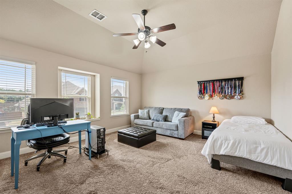 5209 Edgebrook Way Fort Worth, TX 76244 - Photo 25 of 33 a bedroom with bed and a window